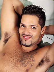 Macho gay bear hottie lays down on a sofa so he could pump his hard dick